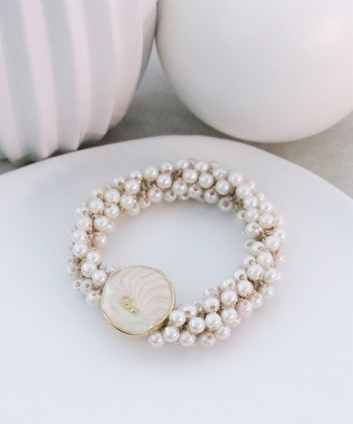 Three Four Time(スリーフォータイム)の「パール編みヘアゴム(ヘアゴム・レディース・アイボリー・FREE)」の1枚目の写真