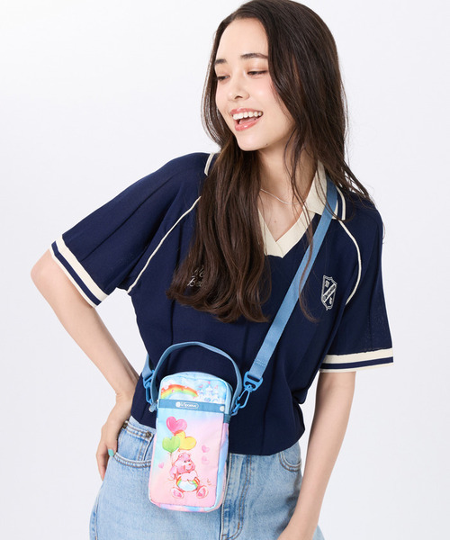 LeSportsac(レスポートサック)の「MINI PHONE CROSSBODY ケアベアレインボー(ショルダーバッグ・レディース・ブルー・FREE)」の1枚目の写真