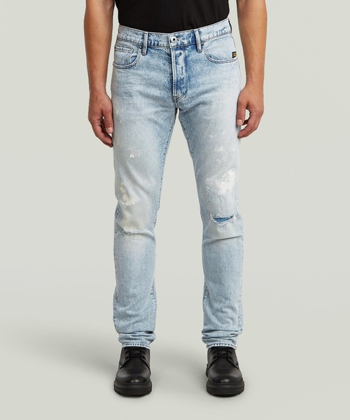 G-STAR(ジースター)の「3301 SLIM JEANS/ヴィンテージライクベーシックスリムテーパードジーンズ/ペイントダメージ加工(デニムパンツ・メンズ・ライトインディゴブルー・33/30/32/30/31/30/30/30/29/30/34/30/28/30/36/30)」の1枚目の写真