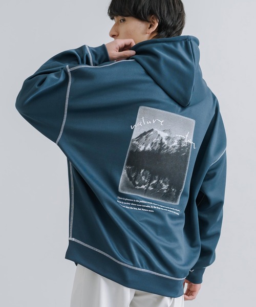 Rocky Monroe(ロッキーモンロー)の「オーバーサイズ グラフィックプリントパーカー 配色ステッチ テックダンボール(パーカー・メンズ・ライトグレー/ブラック/モカ/ブルーグリーン・M/L)」の1枚目の写真