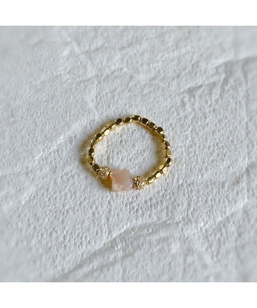 tone(トーン)の「【mastea】天然石ゴムリングゴールド/シェルフラワー小(MA)(リング・レディース・ピンク・FREE)」の1枚目の写真