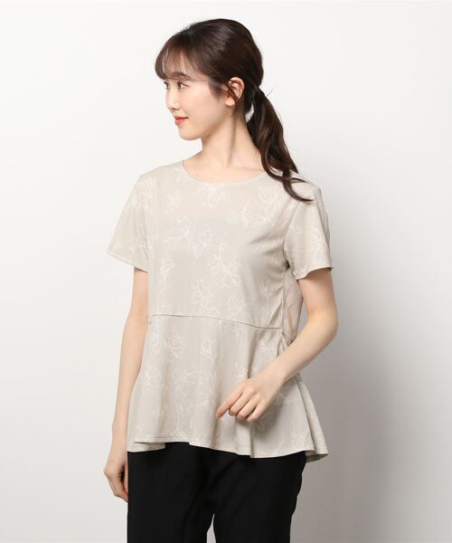 IGNIO(イグニオ)の「イグニオ 半袖ペプラムTシャツ(Tシャツ/カットソー・レディース・ベージュ/ダークグレー/ホワイト×ブラック/ブラック・XL/S/M/L/2XL)」の1枚目の写真