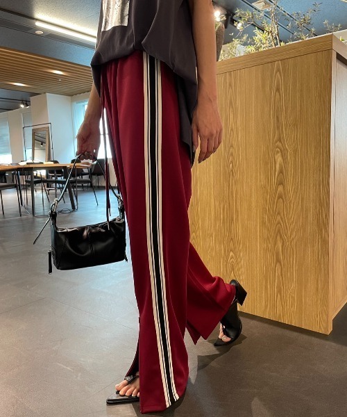AIC.（エーアイシー）の「2WAYサイドライントラックパンツ（その他パンツ・レディース・ブラック/バーガンディー・FREE）」の18枚目の写真