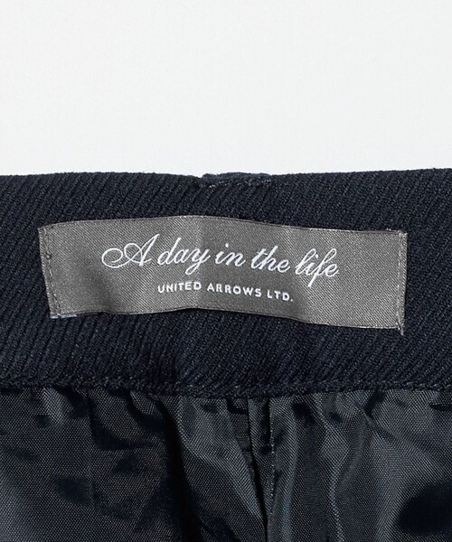 A DAY IN THE LIFE UNITED ARROWS(アデイインザライフユナイテッドアローズ)の「カルゼ タックストレートパンツ ‐セットアップ対応・ウォッシャブル‐ <A DAY IN THE LIFE>(その他パンツ・レディース・ネイビー/モカ・40/38/36)」の14枚目の写真