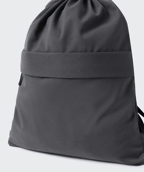 MUSINSA STANDARD（ムシンサスタンダード）の「TR ミニマルドローストリングバックパック [グレー]（バックパック/リュック・レディース・その他・FREE）」の2枚目の写真