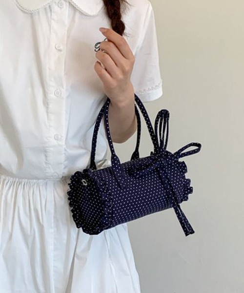 HOOK(フック)の「HOOK for girls ドット × フリル × リボン 円筒型ミニボストンハンドバッグ(ボストンバッグ・レディース・ライトベージュ/ネイビー/ブルー・FREE)」の1枚目の写真