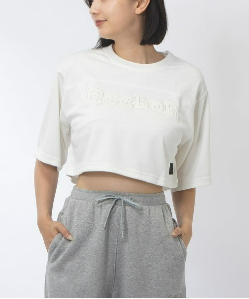 Reebok(リーボック)の「チーム トップ / TEAM TOP(Tシャツ/カットソー・レディース・ホワイト・XX-LARGE/SMALL/MEDIUM/LARGE/X-LARGE)」の1枚目の写真