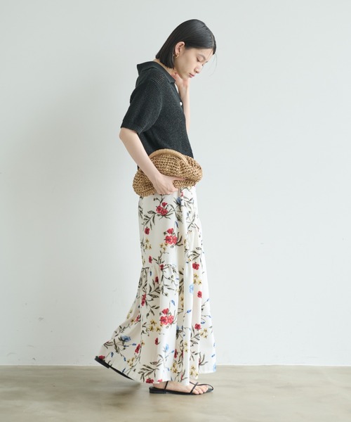 Shelly island（シェリーアイランド）の「ゴールドボタンスキッパーポロサマーニット（ニット/セーター・レディース・ホワイト/ブラック・FREE）」の7枚目の写真