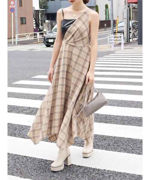EVRIS（エヴリス）の「フェイクレザードッキングチェックロング