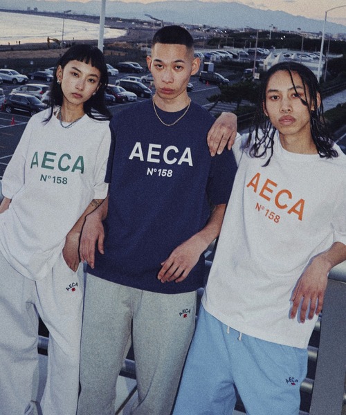 AECA(エイカ)の「AECA BIG LOGO TEE(Tシャツ/カットソー・メンズ・グリーン/マスタード/ラベンダー/オレンジ/ネイビー/ブラック・MEDIUM/LARGE)」の1枚目の写真