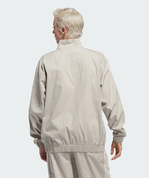 adidas（アディダス）の「スケートボーディング ファイヤーバード トラックジャケット（ジェンダーニュートラル） / アディダスオリジナルス adidas Originals（ナイロンジャケット・メンズ・ブラック/グレー・MEDIUM/SMALL/XX-LARGE/LARGE/X-LARGE/X-SMALL/3XL）」の3枚目の写真