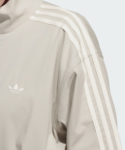 adidas（アディダス）の「スケートボーディング ファイヤーバード トラックジャケット（ジェンダーニュートラル） / アディダスオリジナルス adidas Originals（ナイロンジャケット・メンズ・ブラック/グレー・MEDIUM/SMALL/XX-LARGE/LARGE/X-LARGE/X-SMALL/3XL）」の5枚目の写真