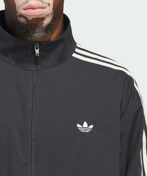 adidas（アディダス）の「スケートボーディング ファイヤーバード トラックジャケット（ジェンダーニュートラル） / アディダスオリジナルス adidas Originals（ナイロンジャケット・メンズ・ブラック/グレー・MEDIUM/SMALL/XX-LARGE/LARGE/X-LARGE/X-SMALL/3XL）」の10枚目の写真