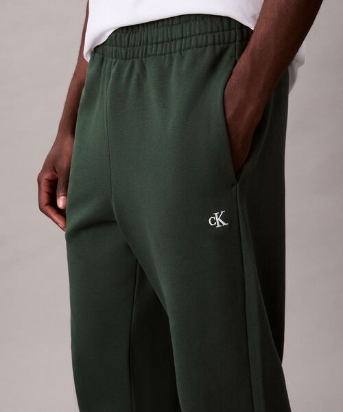 Calvin Klein(カルバン・クライン)の「モノグラム ジョガーパンツ(スウェットパンツ・メンズ・ブラック/ダークグリーン・L/M/S)」の12枚目の写真