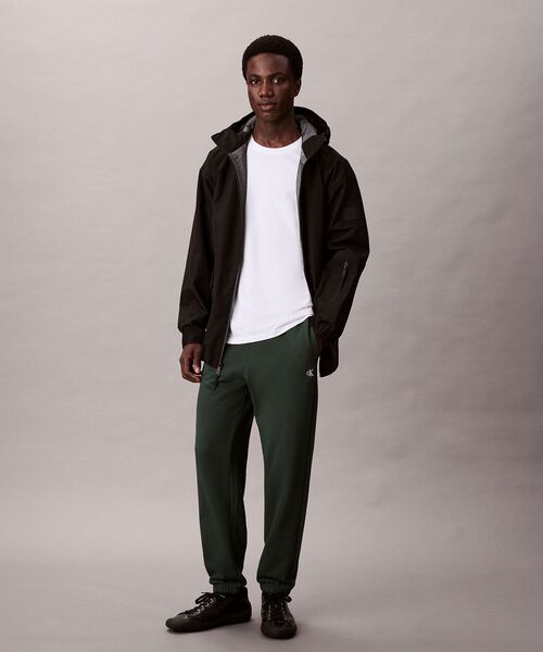 Calvin Klein(カルバン・クライン)の「モノグラム ジョガーパンツ(スウェットパンツ・メンズ・ブラック/ダークグリーン・L/M/S)」の14枚目の写真