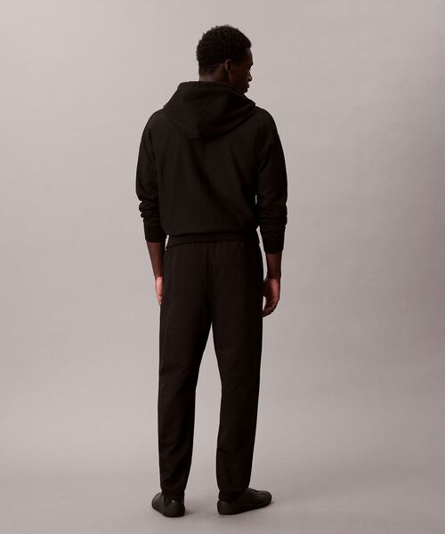 Calvin Klein(カルバン・クライン)の「モノグラム ジョガーパンツ(スウェットパンツ・メンズ・ブラック/ダークグリーン・L/M/S)」の7枚目の写真