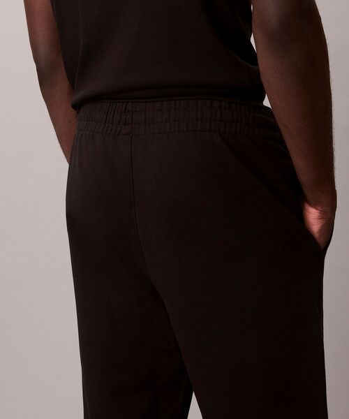 Calvin Klein(カルバン・クライン)の「モノグラム ジョガーパンツ(スウェットパンツ・メンズ・ブラック/ダークグリーン・L/M/S)」の4枚目の写真