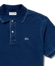 LACOSTE（ラコステ）の「オーバーサイズ インディゴ 半袖ポロシャツ（ポロシャツ）」