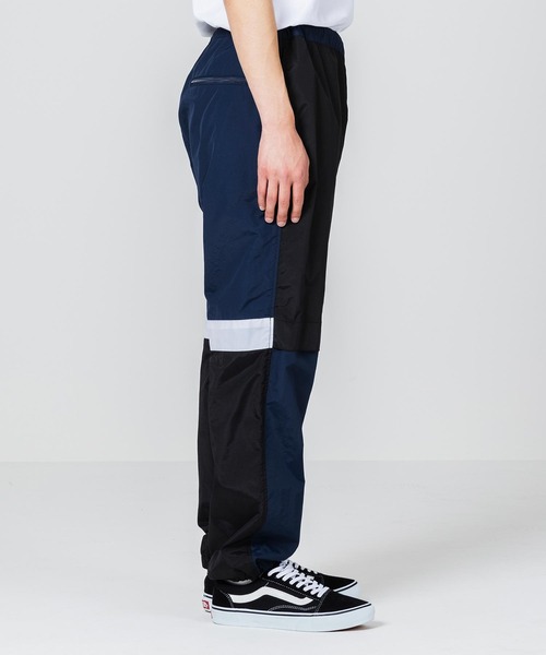 XLARGE（エクストララージ）の「WARM UP NYLON PANTS（その他パンツ・メンズ・ブラック/オリーブ・S/M/L/XL）」の5枚目の写真