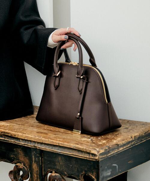 UNTITLED（アンタイトル）の「【追加8／名品】2WAYポケットボストンバッグ（ハンドバッグ・レディース・ナチュラル/ブラック/ブラウン系その他/キャメル/アイボリー系3/サンドベージュ/ブラウン系その他2/ブラウン系その他5/ベージュ系その他7/ブラック系5・99）」の4枚目の写真