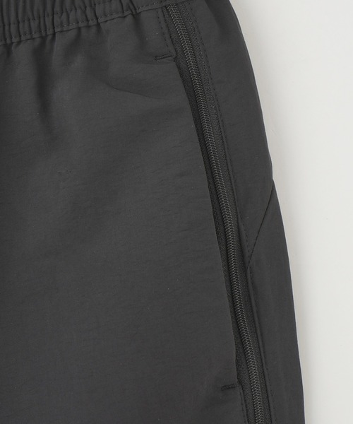 PUMA(プーマ)の「PUMA WMNS DARE TO RELAXED WOVEN ZIPOFF PANT OP 631913(その他パンツ・メンズ・ブラック・S)」の5枚目の写真