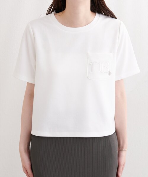 natural couture(ナチュラルクチュール)の「チャーム付きロゴ刺繍ショートT(Tシャツ/カットソー・レディース・ブラウン/ネイビー/オフホワイト・FREE)」の18枚目の写真