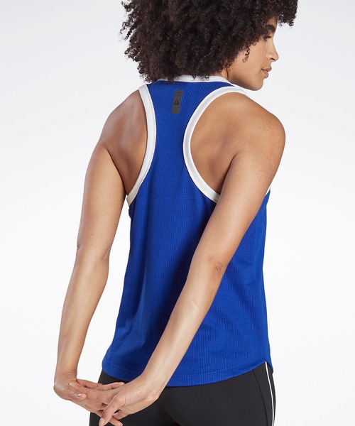 Reebok(リーボック)の「レズミルズR スリーブレス Tシャツ / Les MillsR Sleeveless Tee(タンクトップ・レディース・ブルー/グレー・SMALL/MEDIUM/LARGE/X-LARGE/XX-LARGE/X-SMALL)」の3枚目の写真