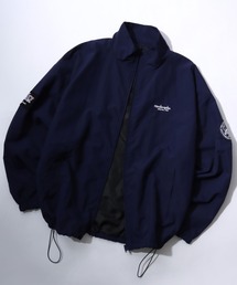 Mark Gonzales（マーク・ゴンザレス）の「MARK GONZALES ARTWORK COLLECTION/マークゴンザレス 別注 オーバーサイズ パイピング ナイロンジャケット/トラックジャケット/ブルゾン/レディース メンズ（ナイロンジャケット）」