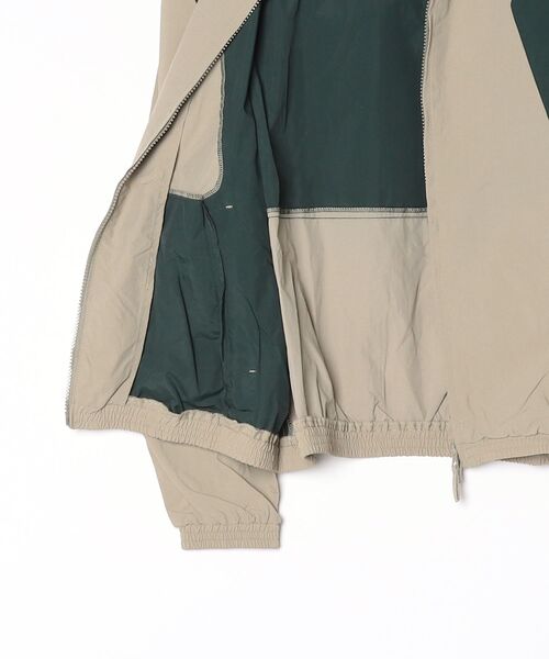 Vini(ヴィニ)の「【Vini】バイカラー ウィンドブレーカー(ブルゾン・レディース・ホワイト/カーキ・SMALL/MEDIUM/LARGE)」の20枚目の写真