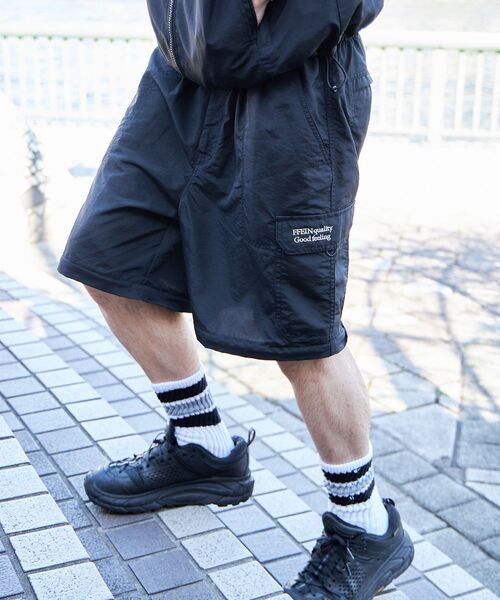 FFEIN（フェイン）の「【FFEIN(フェイン)】２WAYナイロンテックワイドカーゴパンツ / ドローコード付き ハーフパンツ（カーゴパンツ・メンズ・ブラック/カーキ/ダークパープル/ネイビー/ベージュ・SMALL/MEDIUM/LARGE）」の8枚目の写真