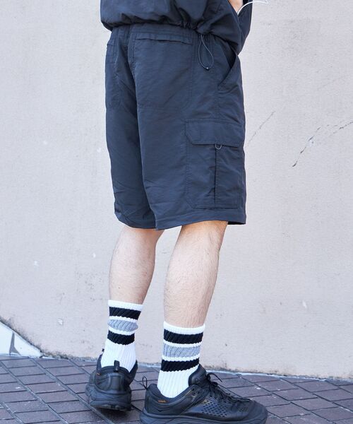 FFEIN（フェイン）の「【FFEIN(フェイン)】２WAYナイロンテックワイドカーゴパンツ / ドローコード付き ハーフパンツ（カーゴパンツ・メンズ・ブラック/カーキ/ダークパープル/ネイビー/ベージュ・SMALL/MEDIUM/LARGE）」の12枚目の写真