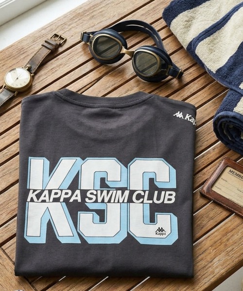 Kappa(カッパ)の「≪ウェルネスシリーズ≫スイムラフィック ユニセックスTシャツ(Tシャツ/カットソー・レディース・ホワイト/ブラック・LARGE/MEDIUM/SMALL)」の1枚目の写真