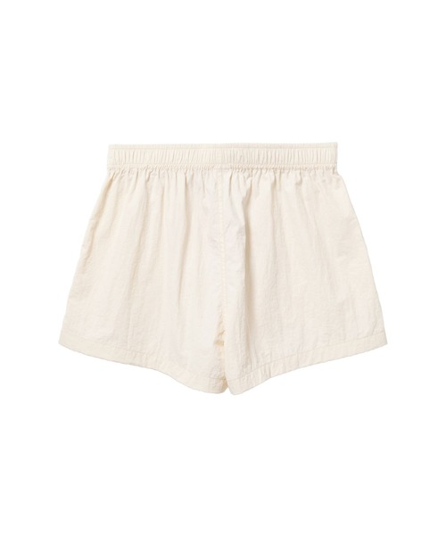 A BATHING APE（アベイシングエイプ）の「RUBBER PRINTED LOGO NYLON TRAINING SHORTS（その他パンツ・レディース・アイボリー/ネイビー・X-SMALL/SMALL）」の3枚目の写真