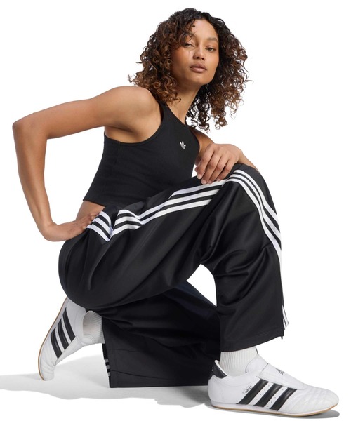 adidas(アディダス)の「adidas FIREBIRD BARREL TRACK PANTS / アディダス ファイヤーバード バレル トラックパンツ(その他パンツ・レディース・ブラック・M/S/L)」の2枚目の写真