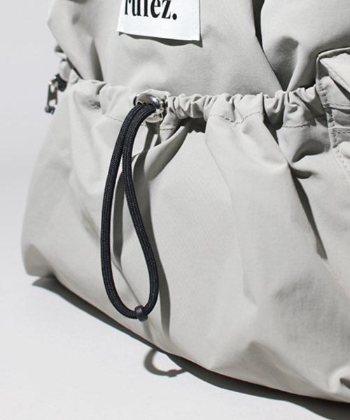 MASMARULEZ（マスマルールズ）の「[INT] String flap backpack _ Gray（バックパック/リュック・レディース・その他・FREE）」の8枚目の写真