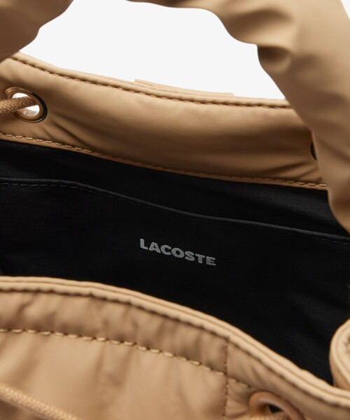 LACOSTE（ラコステ）の「ナイリア キルティングバケットショルダー