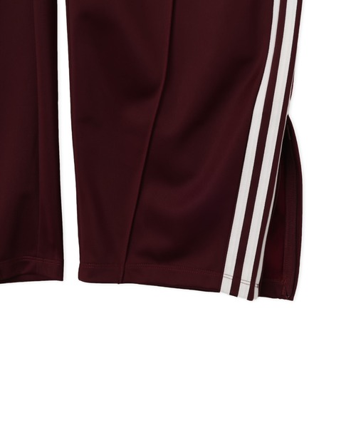 adidas(アディダス)の「adidas FIREBIRD BARREL TRACK PANTS / アディダス ファイヤーバード バレル トラックパンツ(その他パンツ・レディース・バーガンディー・L/M/S)」の6枚目の写真