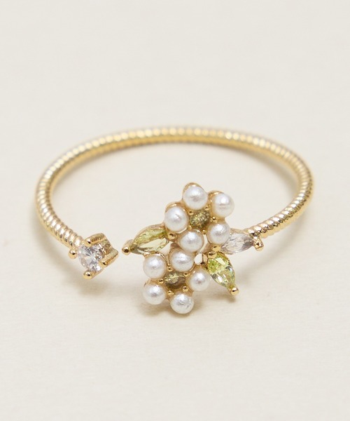 Zoule(ゾーラ)の「Zoule ゾーラ:FLOWER LETTER SERIES jewel flower letter R-2 花言葉 ネモフィラ プルメリア リング(リング・レディース・ホワイト×グリーン/ブルー・FREE)」の1枚目の写真