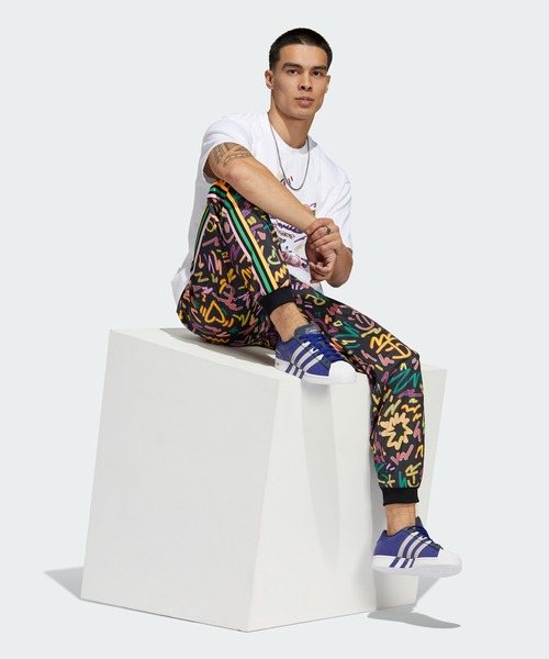 adidas（アディダス）の「ラブ ユナイツ プリントトラックパンツ 