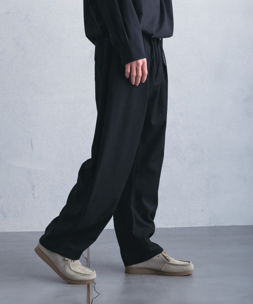 +phenix(プラスフェニックス)の「【WEB・直営店限定】+phenix(プラスフェニックス)COCOON SILHOUETTE RELAXED PANTS コクーンシルエット リラックス パンツ(その他パンツ・メンズ・ブラック/チャコール・M/XL/L)」の3枚目の写真