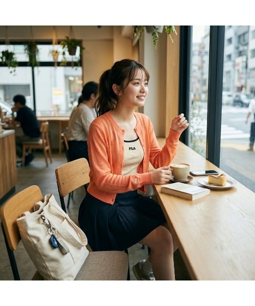 FILA(フィラ)の「SUMMER KNIT CARDIGAN(カーディガン/ボレロ・レディース・オレンジ/ホワイト/ライトグリーン・M/L/XL)」の3枚目の写真