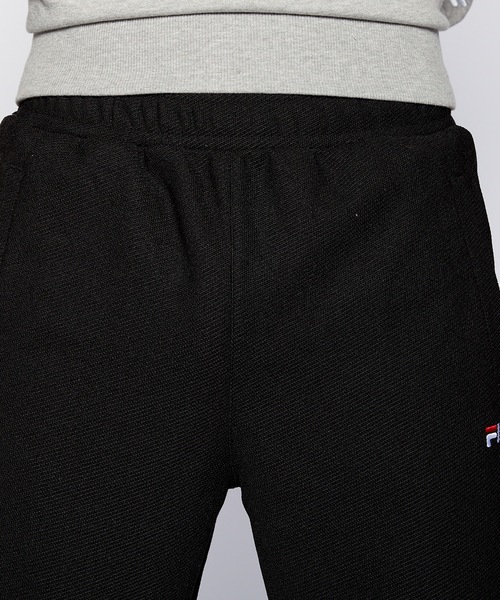 FILA(フィラ)の「【FILA / フィラ】保温 UVカット 裏起毛テーパードパンツ(スラックス・メンズ・ブラック/杢グレー/ネイビー・MEDIUM/LARGE/X-LARGE)」の10枚目の写真