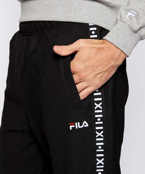 FILA(フィラ)の「【FILA / フィラ】保温 UVカット 裏起毛テーパードパンツ(スラックス・メンズ・ブラック/杢グレー/ネイビー・MEDIUM/LARGE/X-LARGE)」の11枚目の写真