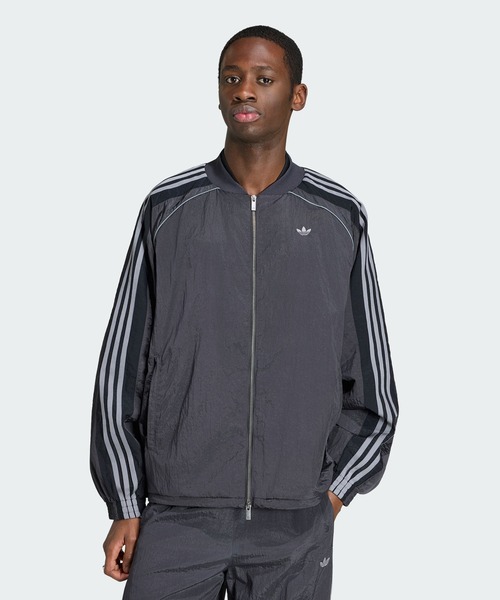 adidas(アディダス)の「ADILENIUM シーズン 5 トラックトップ / ジャージ / トラックジャケット / アディダスオリジナルス adidas Originals(ジャージ・メンズ・ブラック・XX-LARGE/3XL/LARGE/MEDIUM/SMALL/X-LARGE/X-SMALL)」の1枚目の写真