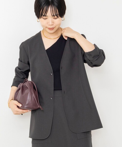 Rie Miller(リエミラー)の「《セットアップ対応/撥水》ウォッシャブルジャケット風ブラウス(ノーカラージャケット・レディース・キャメル/チャコールグレー・38)」の12枚目の写真