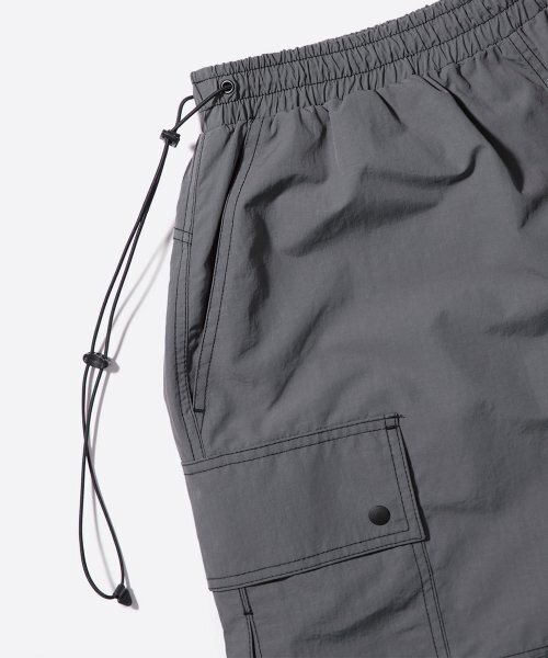 WMC(ダブリューエムシー)の「リップストップジッパーカーゴパンツ_CHARCOAL GREY(スウェットパンツ・レディース・ダークグレー・30(M)/32(L))」の5枚目の写真