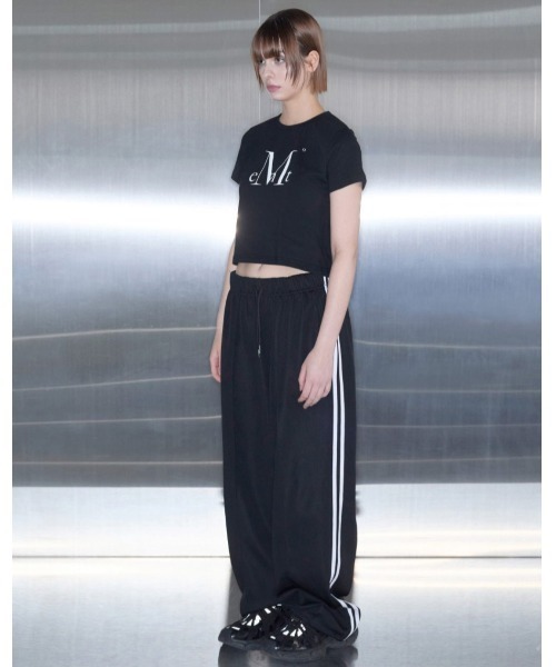 MUCENT(ムセント)の「A'GEM/9 × .kom 『MUCENT/ムセント』MAIN SYMBOL SIGNATURE LOGO HALF TEE/メインシンボルシグニチャーロゴ半袖Tシャツ(Tシャツ/カットソー・レディース・ホワイト/ブラック・S)」の6枚目の写真