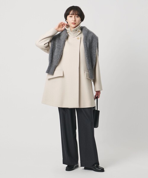 UNITED ARROWS(ユナイテッドアローズ)の「2WAYカラー ミドルコート(ステンカラーコート・レディース・オフホワイト/グレー系/ネイビー・36/38/34)」の12枚目の写真