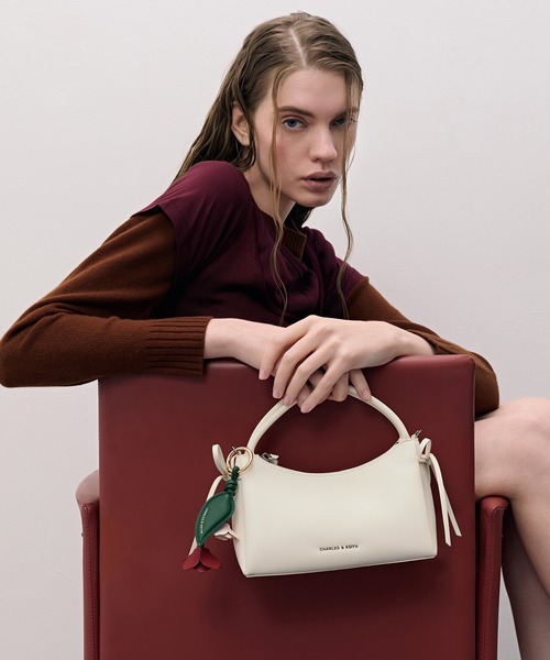 CHARLES & KEITH(チャールズ & キース)の「Hazel ヘーゼル ボウトップハンドルバッグ(ショルダーバッグ・レディース・スミクロ/ピンク系その他3/クリーム・S)」の9枚目の写真