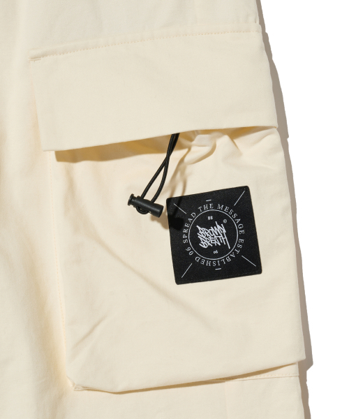 BROWNBREATH(ブラウンブレス)の「STAMP TAG CARGO PANTS - IVORY(その他パンツ・レディース・その他・S/M/L)」の5枚目の写真